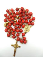 Rosario Acero Dorado en Turquesa Roja. Cristo de san Benito