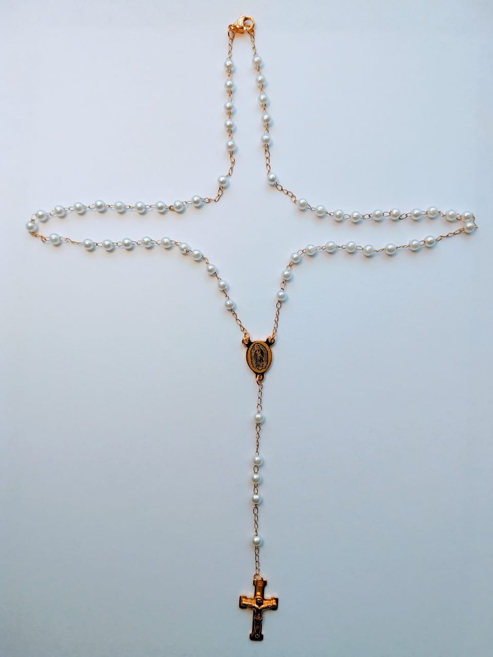 Rosario Acero Dorado, perlitas y virgen de Guadalupe en el Crucero